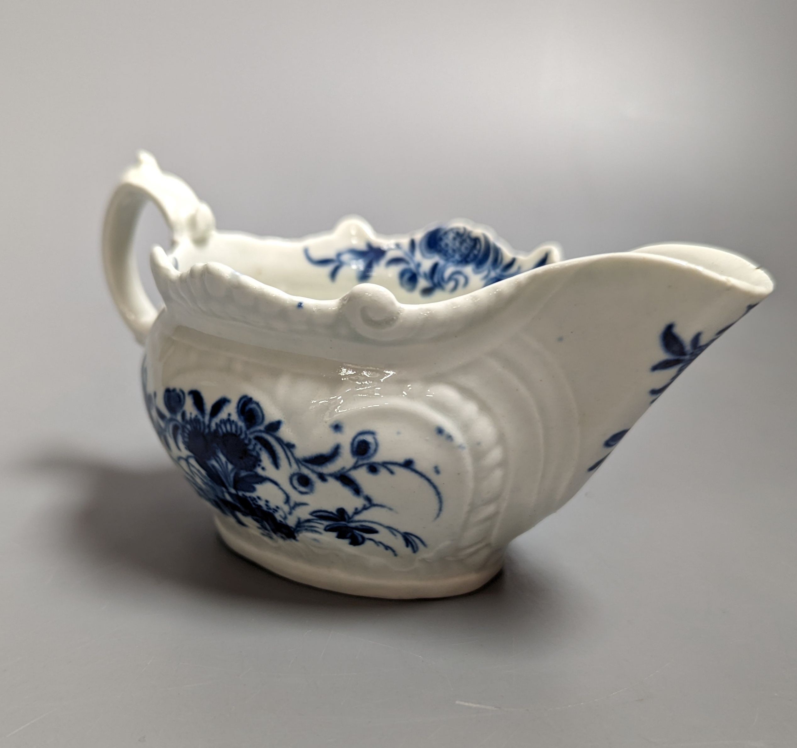 A small Worcester creamboat well painted with the Two Porter Landscape, c.1765, 6cms high